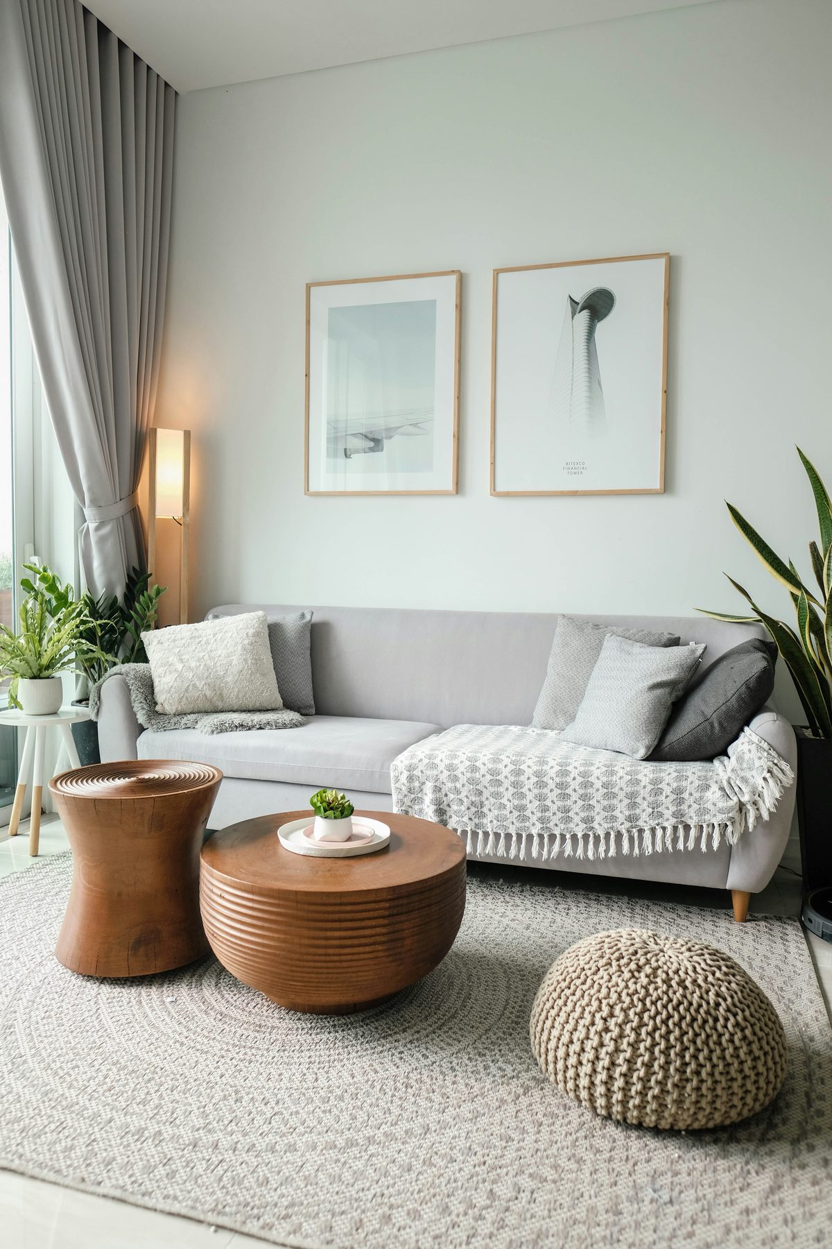 Tidy, freshly cleaned living room with sofa and plants